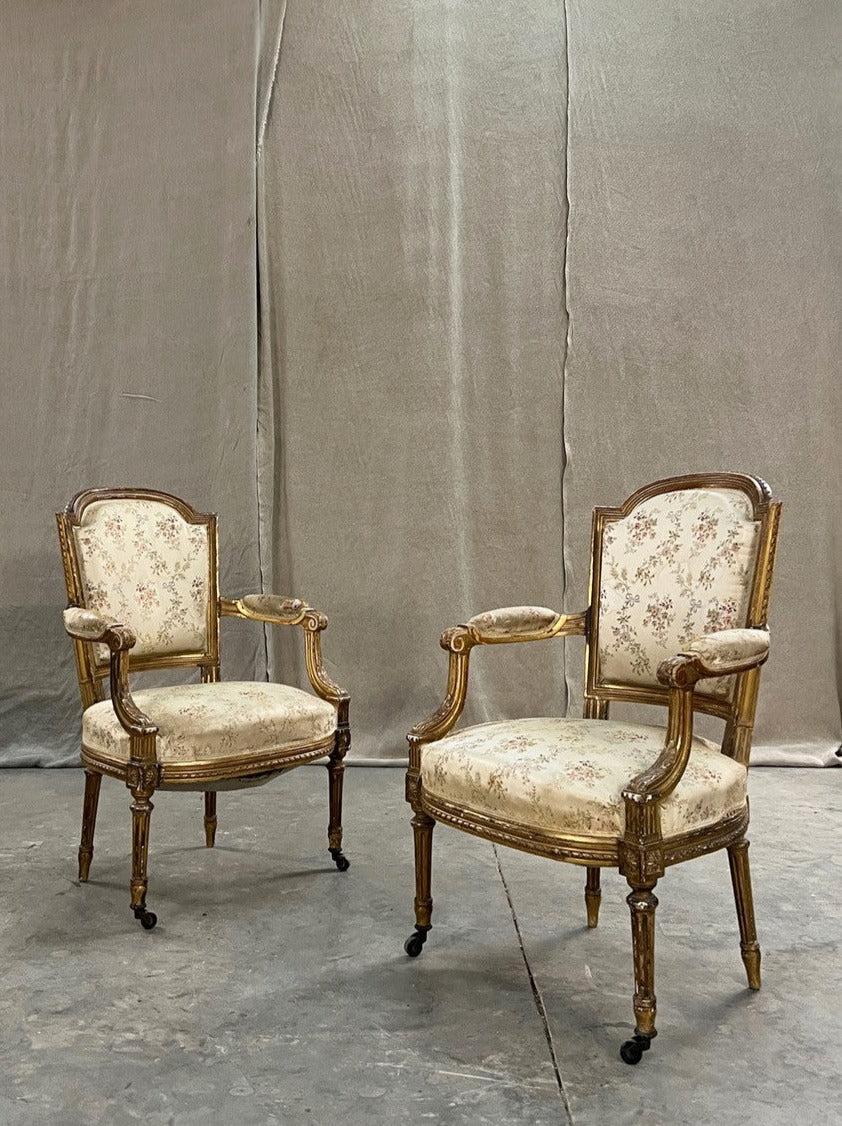 Pair of gilded armchairs