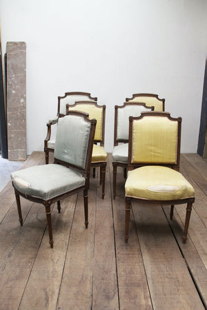 Set of upholstered dining chairs