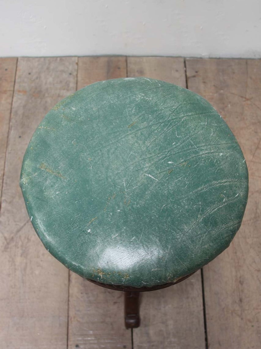 Leather topped piano stool