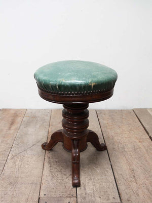 Leather topped piano stool