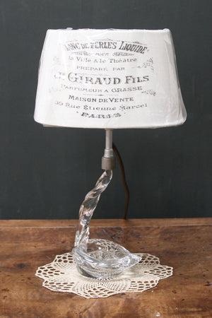 Glass base table lamp