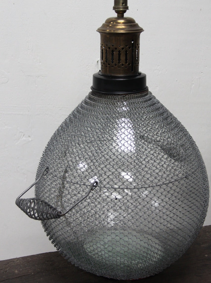 Glass bottle lamp (small, on the right)
