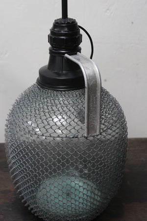 Glass bottle lamp (small, on the right)