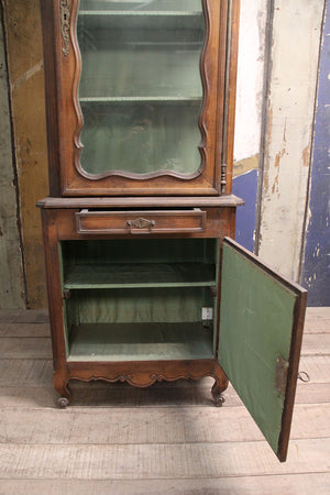 Two-part tall oak glazed cabinet